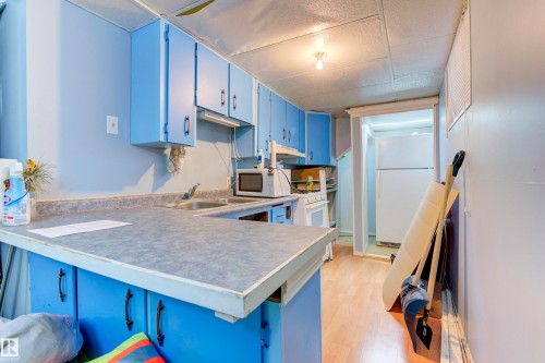 10833 109 Street, Edmonton, AB - Indoor Photo Showing Kitchen With Double Sink