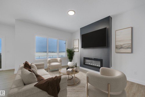 282 Lodge Pole Place, Leduc, AB - Indoor Photo Showing Living Room With Fireplace