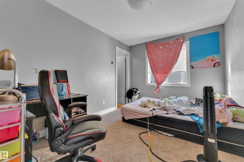 3015 26 Ave Nw, Edmonton, AB - Indoor Photo Showing Bedroom