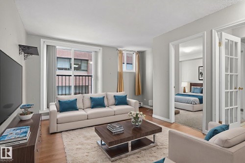 703 9730 106 Street, Edmonton, AB - Indoor Photo Showing Living Room