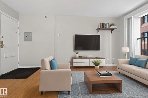 703 9730 106 Street, Edmonton, AB - Indoor Photo Showing Living Room