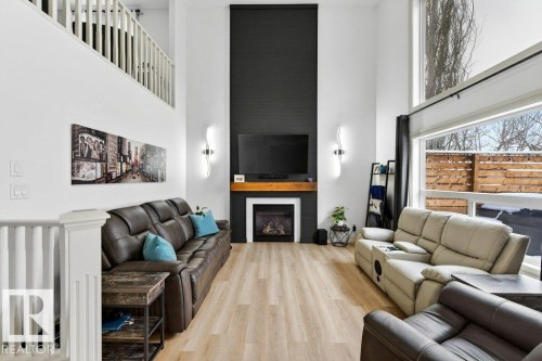24 Hickory Trail, Spruce Grove, AB - Indoor Photo Showing Living Room With Fireplace