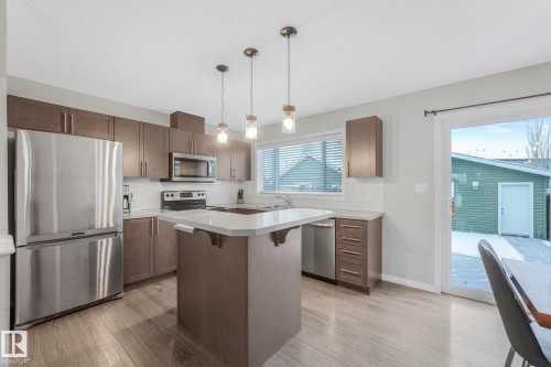 6862 21A Avenue Sw, Edmonton, AB - Indoor Photo Showing Kitchen With Stainless Steel Kitchen With Upgraded Kitchen