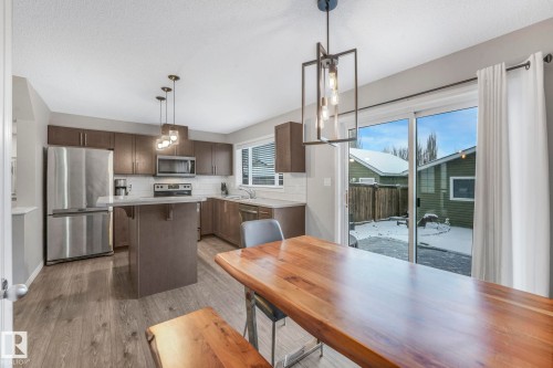 6862 21A Avenue Sw, Edmonton, AB - Indoor Photo Showing Kitchen With Stainless Steel Kitchen