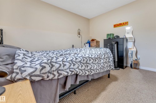 3015 24 Avenue, Edmonton, AB - Indoor Photo Showing Bedroom