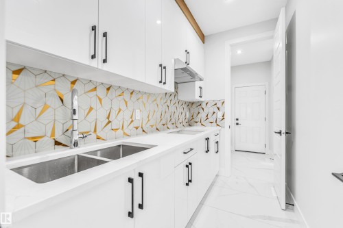 4306 36 Street, Beaumont, AB - Indoor Photo Showing Kitchen With Double Sink