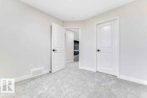 143 Pierwyck Loop, Spruce Grove, AB - Indoor Photo Showing Other Room
