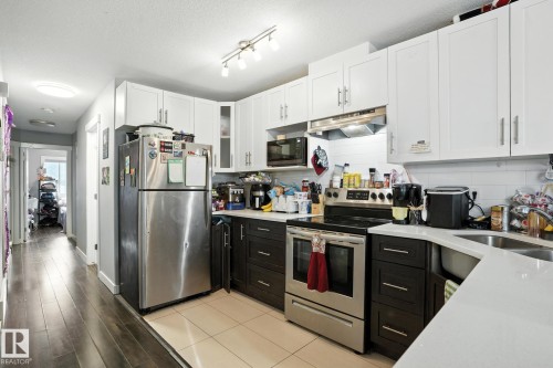 10436 154 Street, Edmonton, AB - Indoor Photo Showing Kitchen With Stainless Steel Kitchen With Double Sink