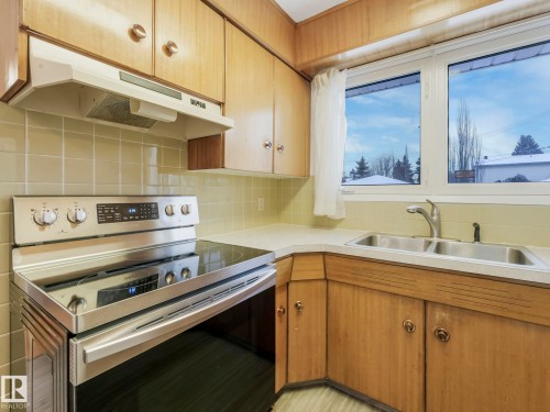 11412 134A Avenue, Edmonton, AB - Indoor Photo Showing Kitchen With Double Sink