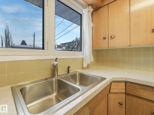 11412 134A Avenue, Edmonton, AB - Indoor Photo Showing Kitchen With Double Sink