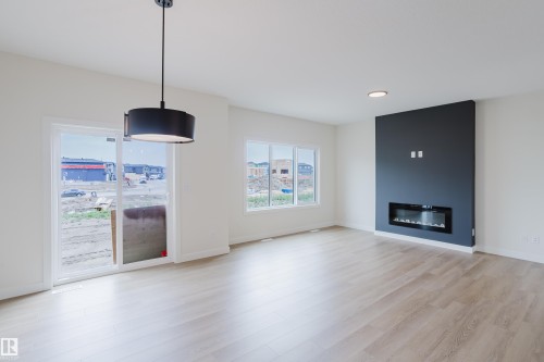 143 Catria Point(E), Sherwood Park, AB - Indoor Photo Showing Living Room With Fireplace