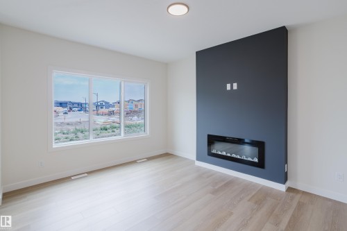 143 Catria Point(E), Sherwood Park, AB - Indoor Photo Showing Living Room With Fireplace