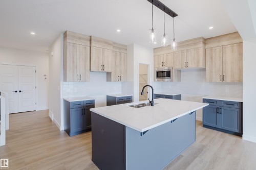 143 Catria Point(E), Sherwood Park, AB - Indoor Photo Showing Kitchen With Double Sink With Upgraded Kitchen