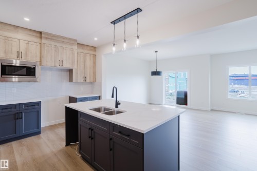 143 Catria Point(E), Sherwood Park, AB - Indoor Photo Showing Kitchen With Double Sink