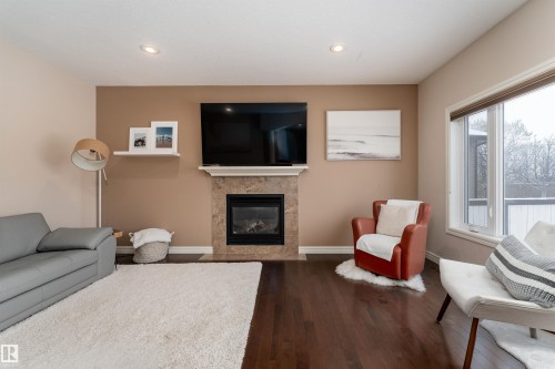 22 Vale Terrace, Fort Saskatchewan, AB - Indoor Photo Showing Living Room With Fireplace