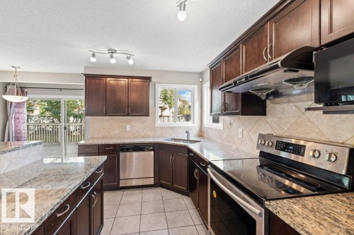 7011 Strom Lane, Edmonton, AB - Indoor Photo Showing Kitchen With Stainless Steel Kitchen With Upgraded Kitchen