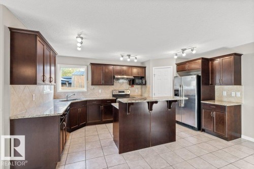 7011 Strom Lane, Edmonton, AB - Indoor Photo Showing Kitchen With Stainless Steel Kitchen With Upgraded Kitchen