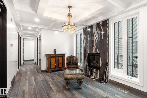 11833 102 Avenue, Edmonton, AB - Indoor Photo Showing Other Room With Fireplace