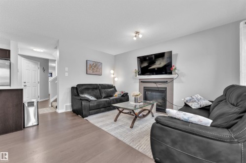 465 Ebbers Way, Edmonton, AB - Indoor Photo Showing Living Room With Fireplace