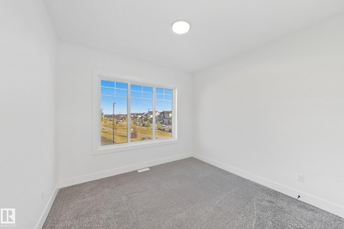144 Edgewater Cir, Leduc, AB - Indoor Photo Showing Other Room