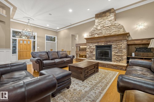 25 53522 Rge Road 274, Rural Parkland County, AB - Indoor Photo Showing Living Room With Fireplace