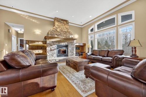 25 53522 Rge Road 274, Rural Parkland County, AB - Indoor Photo Showing Living Room With Fireplace