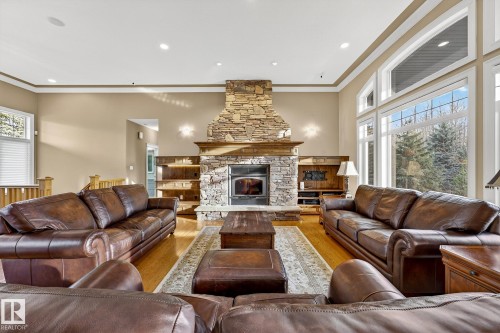 25 53522 Rge Road 274, Rural Parkland County, AB - Indoor Photo Showing Living Room With Fireplace