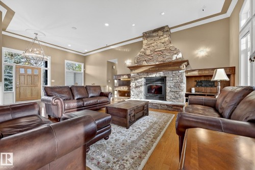 25 53522 Rge Road 274, Rural Parkland County, AB - Indoor Photo Showing Living Room With Fireplace