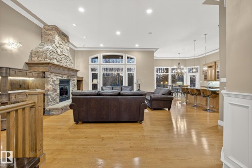 25 53522 Rge Road 274, Rural Parkland County, AB - Indoor Photo Showing Living Room With Fireplace