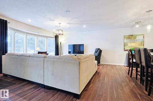 5518 11A Avenue, Edmonton, AB - Indoor Photo Showing Living Room With Fireplace