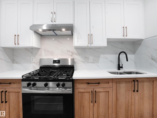 6009 Naden Landing Landing, Edmonton, AB - Indoor Photo Showing Kitchen With Double Sink