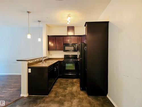 137 7825 71 Street, Edmonton, AB - Indoor Photo Showing Kitchen With Double Sink