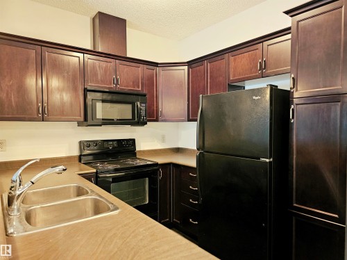 137 7825 71 Street, Edmonton, AB - Indoor Photo Showing Kitchen With Double Sink