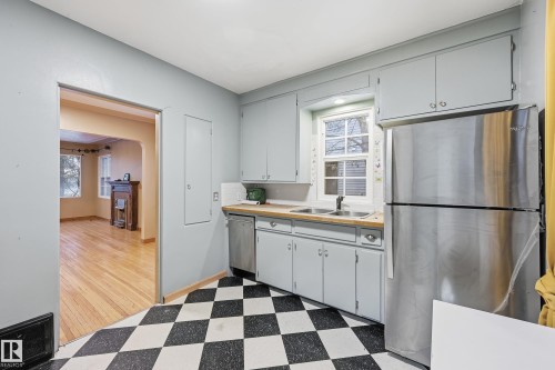 10835 64 Avenue, Edmonton, AB - Indoor Photo Showing Kitchen With Double Sink