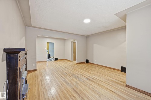 10835 64 Avenue, Edmonton, AB - Indoor Photo Showing Other Room With Fireplace