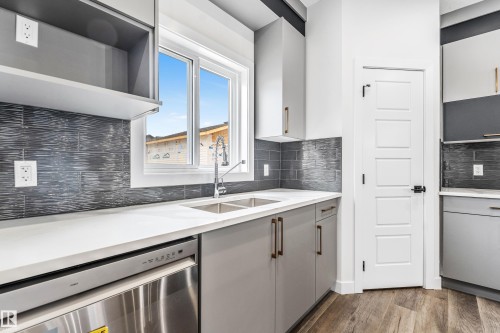 58 Patriot Way, Spruce Grove, AB - Indoor Photo Showing Kitchen With Double Sink