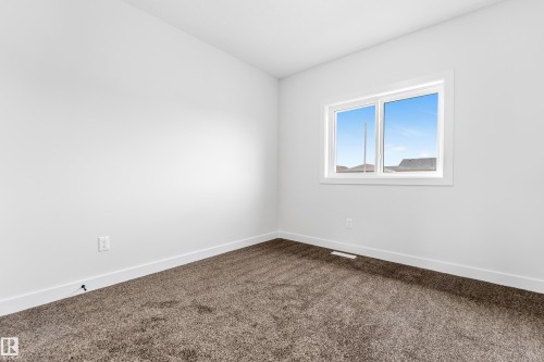 58 Patriot Way, Spruce Grove, AB - Indoor Photo Showing Other Room