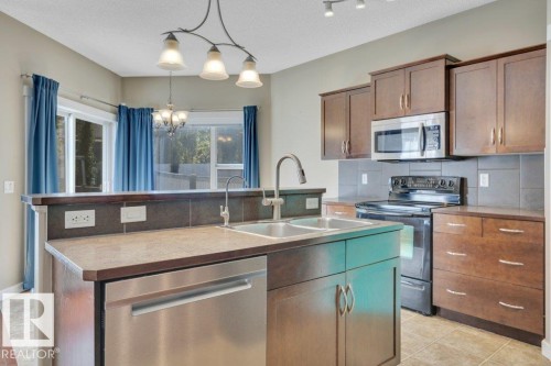 3054 Spence Wynd, Edmonton, AB - Indoor Photo Showing Kitchen With Double Sink