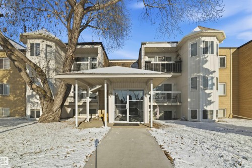 Snow covered property featuring a view of apartment building / complex - 205 11440 40 Ave, Edmonton, AB - Outdoor With Balcony
