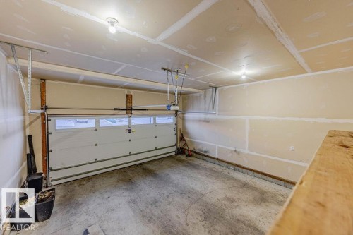 704 Conroy Crest, Edmonton, AB - Indoor Photo Showing Garage