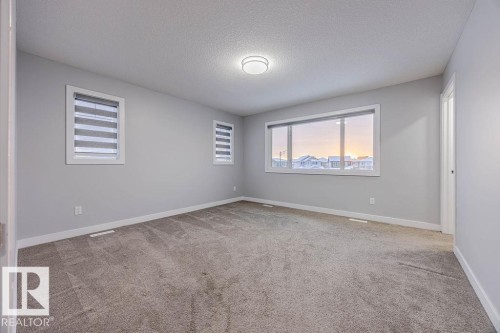 704 Conroy Crest, Edmonton, AB - Indoor Photo Showing Other Room