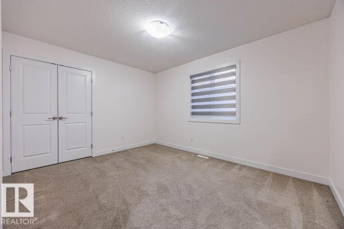 704 Conroy Crest, Edmonton, AB - Indoor Photo Showing Other Room