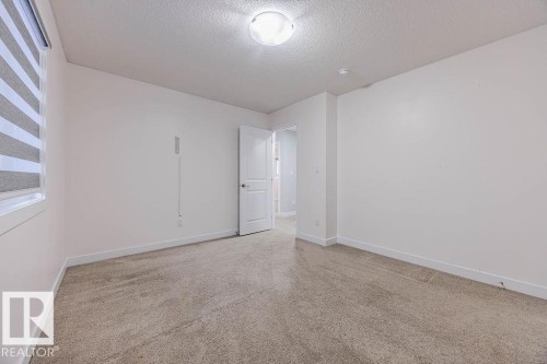 704 Conroy Crest, Edmonton, AB - Indoor Photo Showing Other Room