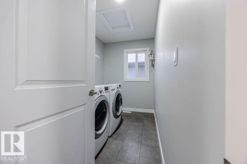 704 Conroy Crest, Edmonton, AB - Indoor Photo Showing Laundry Room