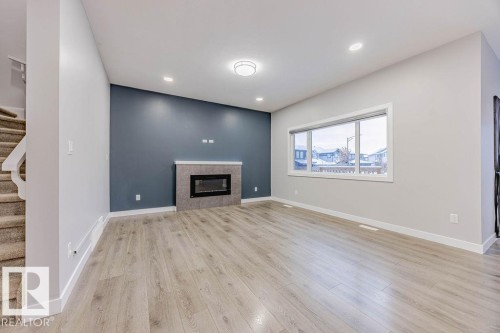 704 Conroy Crest, Edmonton, AB - Indoor With Fireplace
