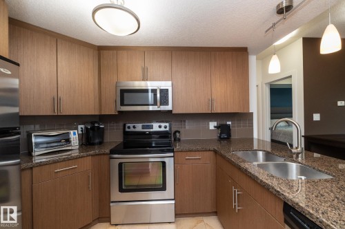 505 10055 118 Street, Edmonton, AB - Indoor Photo Showing Kitchen With Stainless Steel Kitchen With Double Sink