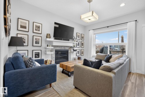 17727 13 Avenue, Edmonton, AB - Indoor Photo Showing Living Room With Fireplace
