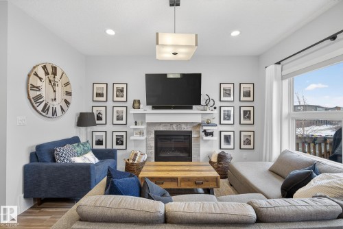 17727 13 Avenue, Edmonton, AB - Indoor Photo Showing Living Room With Fireplace