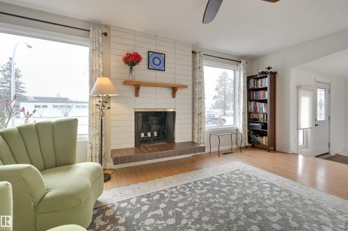 6704 94 Avenue, Edmonton, AB - Indoor Photo Showing Living Room With Fireplace