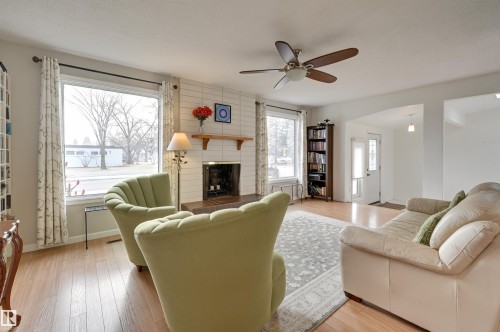 6704 94 Avenue, Edmonton, AB - Indoor Photo Showing Living Room With Fireplace